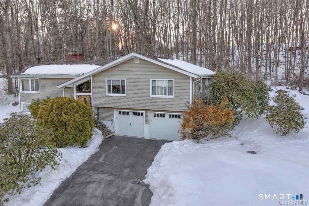 This beautiful home is nestled in one of the most sought after lake communities in Mahopac, Lake MacGregor.