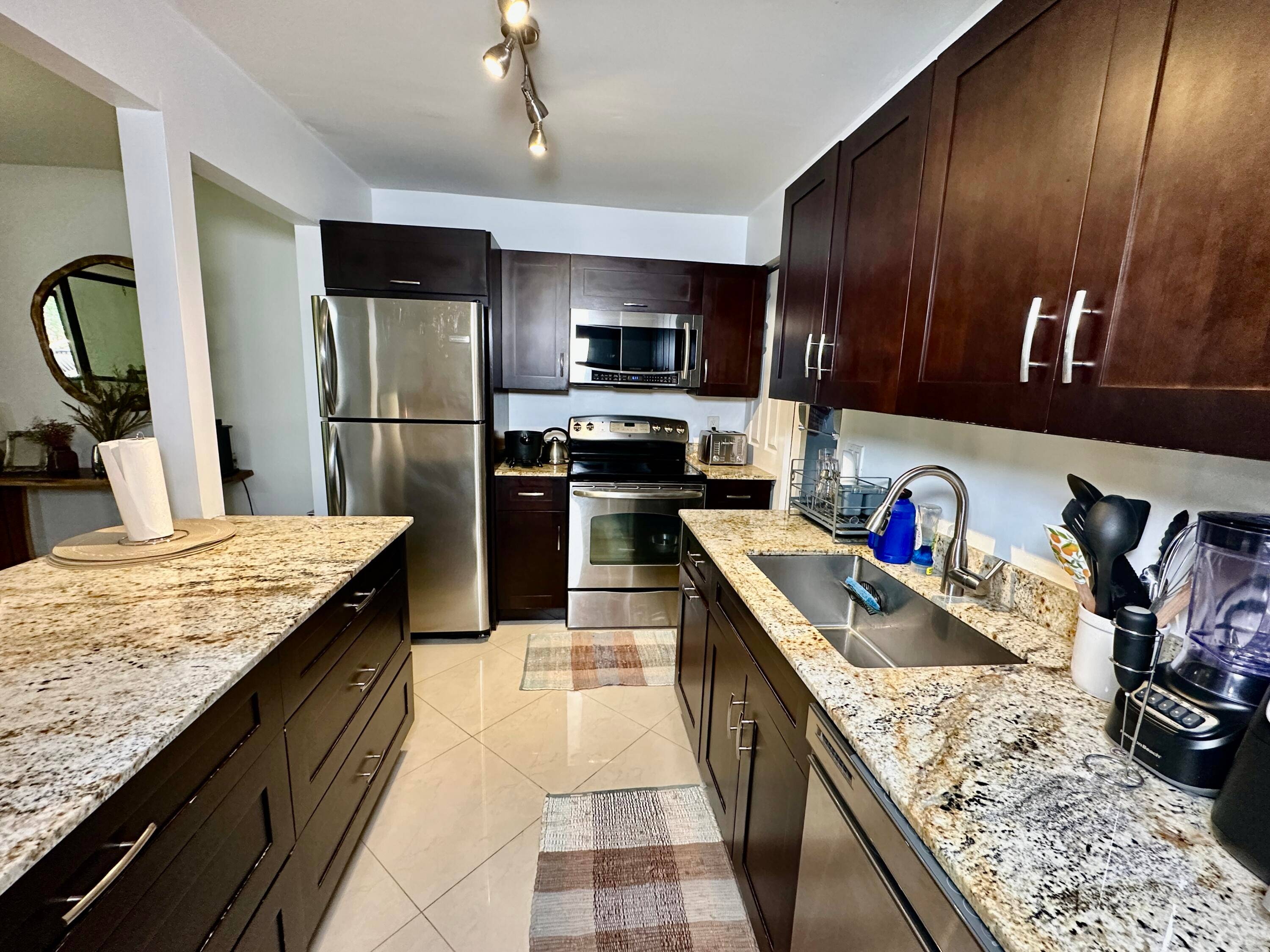 Stunningly renovated 2BR 2BA townhome in the highly desirable East Boca Raton.