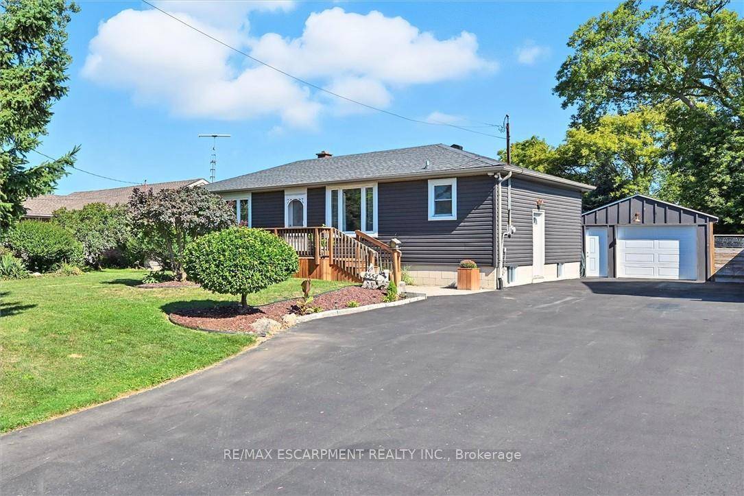 Welcome to 8554 Haldibrook Road Where Country Charm Meets Modern Comfort !