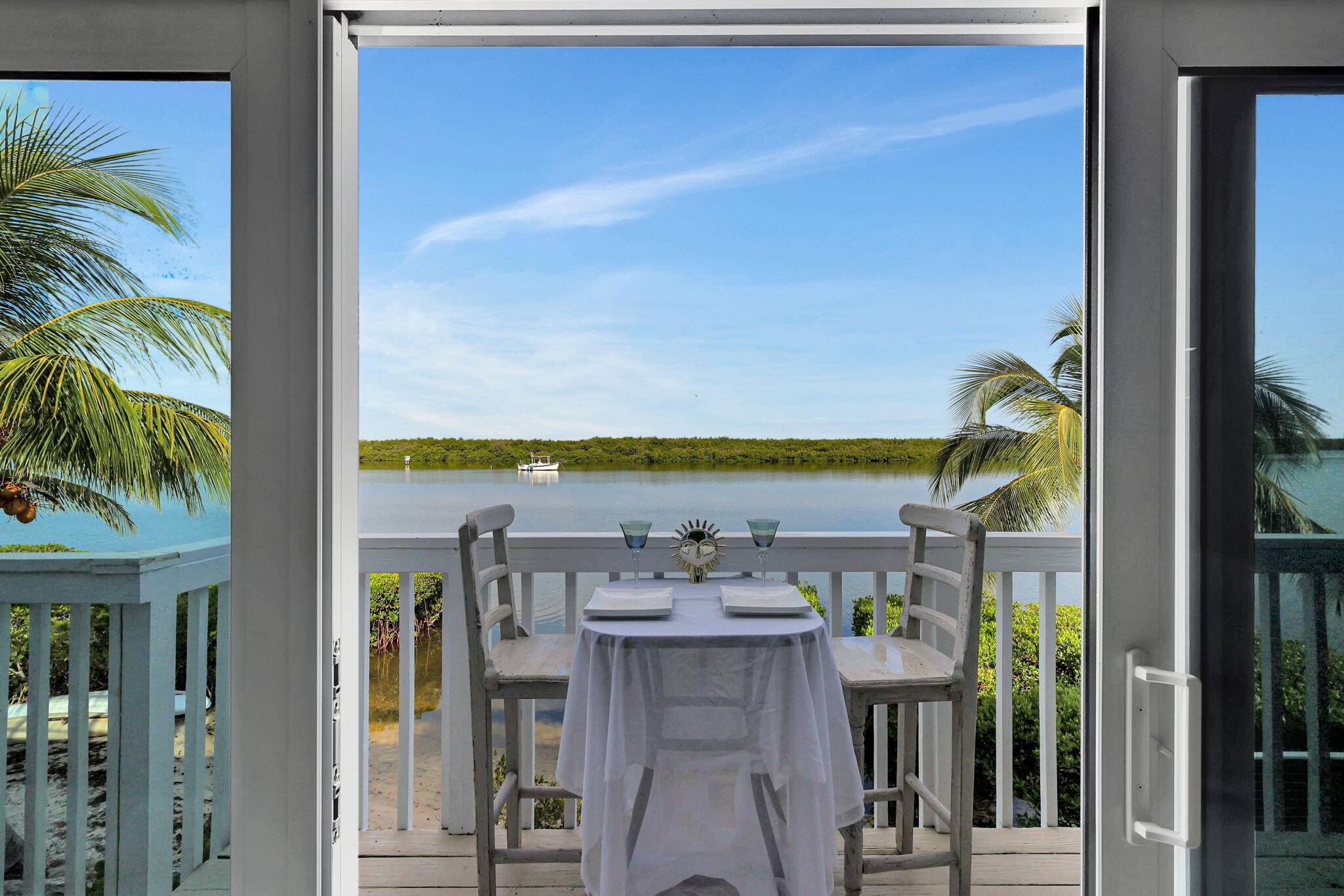 This spectacular, fully renovated riverfront townhome proudly featured on HGTV's Beachfront Bargain Renovation redefines luxury with three levels of stylish, turnkey living and the most breathtaking views on North Hutchinson ...