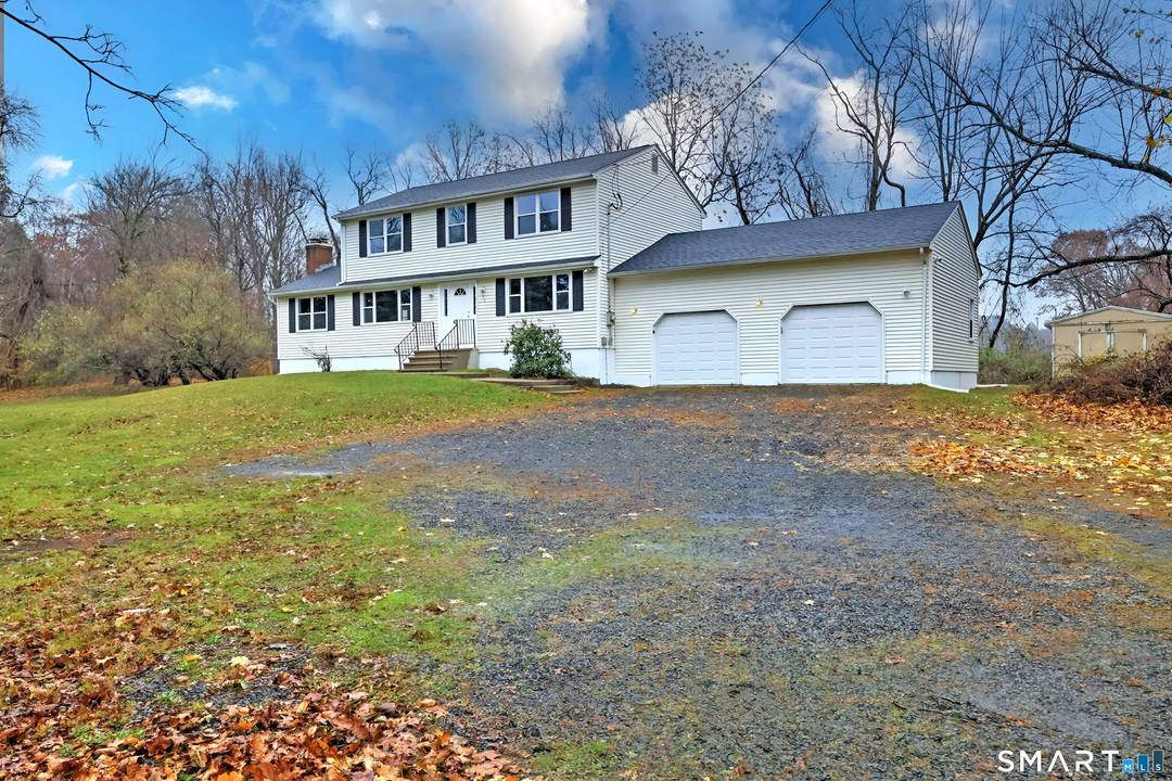 Welcome to this spacious Colonial located at 50 Bassett Rd in North Haven.