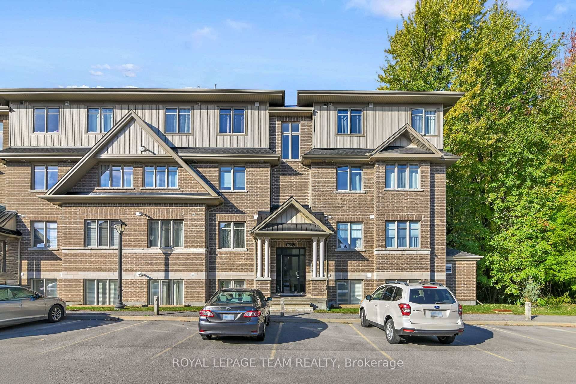 Exceptional 2 bedroom, 2 bath, END UNIT backing onto beautiful trees and with a private balcony to sit and enjoy nature.