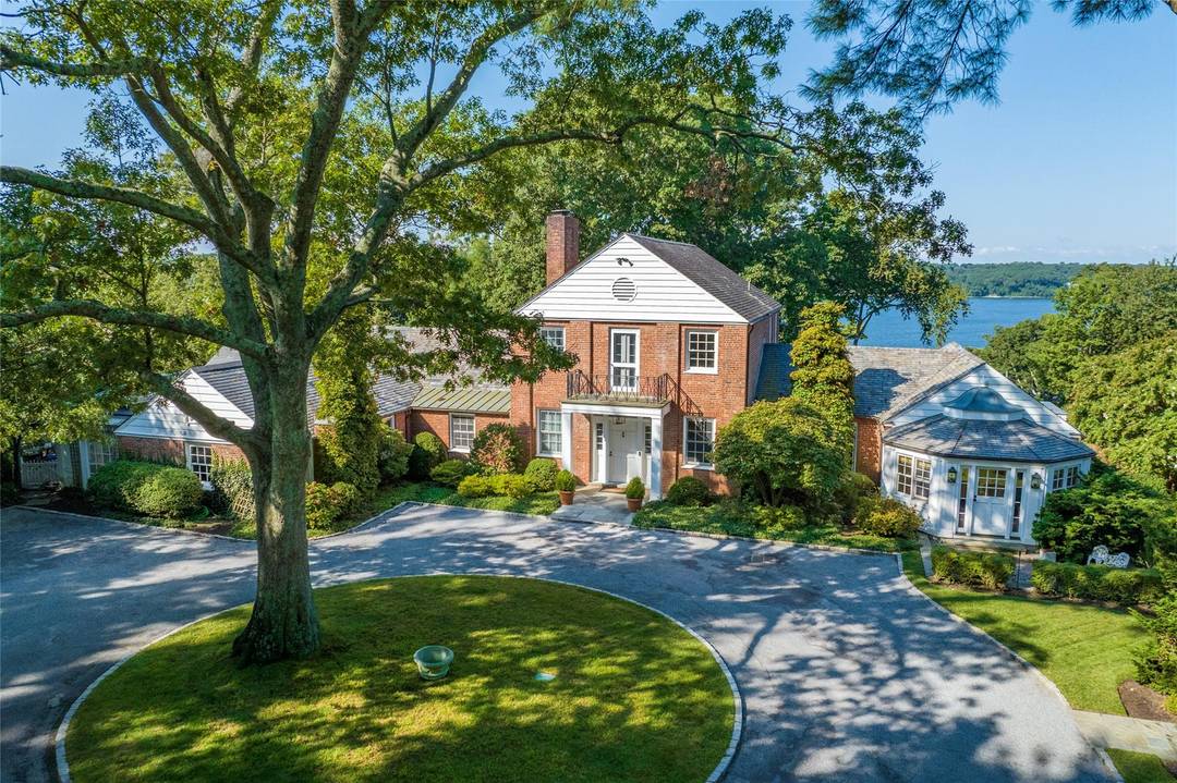 Eagle s Beak, a Magnificent Estate in Cold Spring Harbor with Incredible Western Sunsets a timeless, classic brick residence overlooking Cold Spring Harbor commands 180 degree panoramic water views.