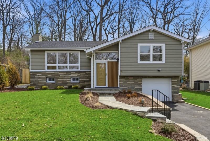 This stunning home in White Meadow Lake, Rockaway, offers a perfect blend of modern style and everyday comfort.