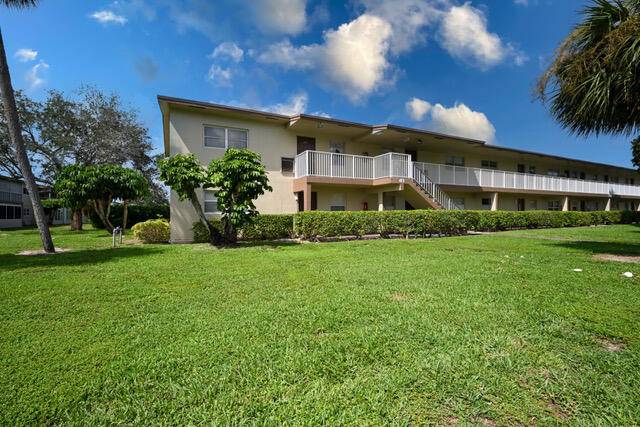 Rarely available ground floor corner unit in the active 55 community of Oriole Gardens.