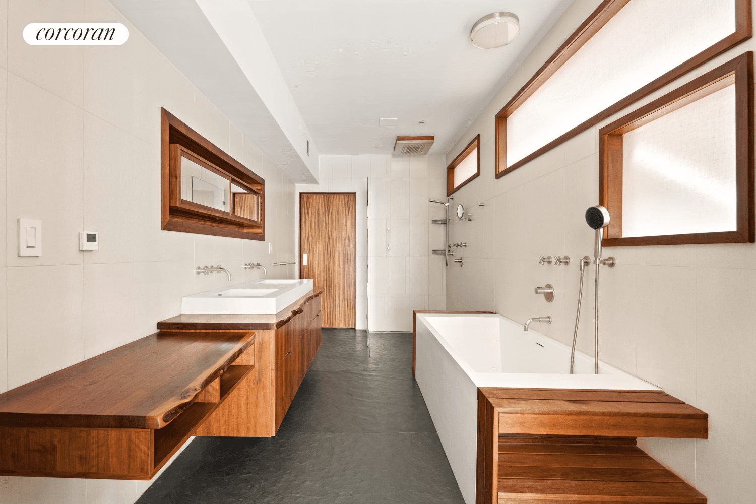 Built in the 1850's, this massive federal style brick townhouse underwent a complete renovation in 2010 that showcases its rare 22' x 60' proportions on four floors through the lens ...