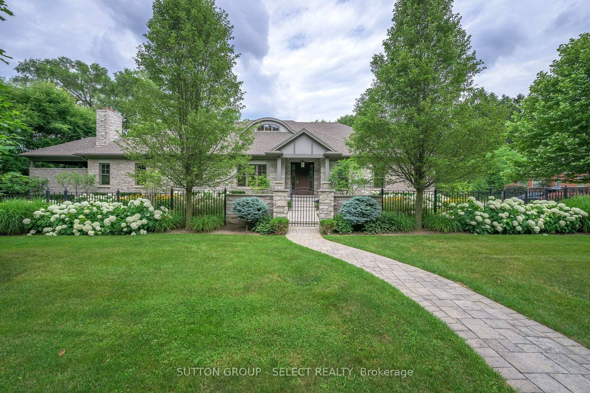 Exceptional executive home in a prestigious enclave bordering Western University.