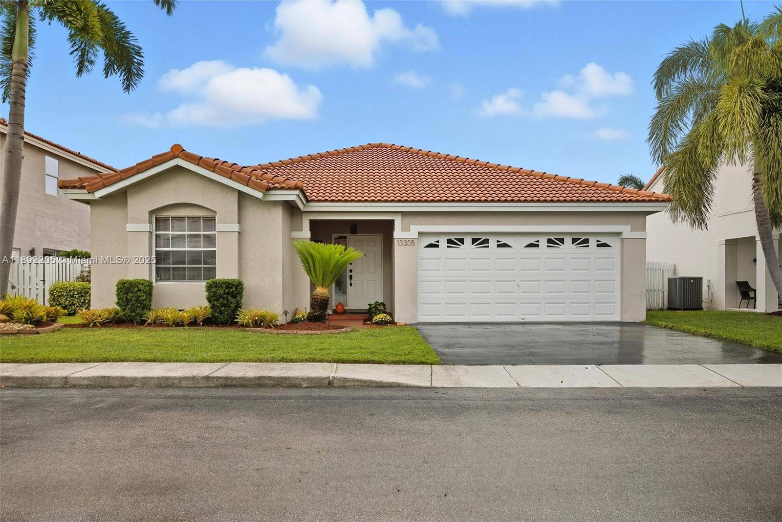 Discover your serene retreat in this beautifully maintained lakefront home, nestled within the quiet and private Osprey West community in west Sunrise, Fl.