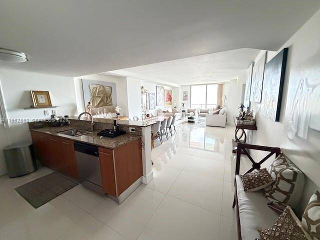 AS IS fully remodeled and beautifully maintained 2 bedroom, 2 bathroom, 1 studio den with walk in closet, apartment located on the 11th floor at Metropolis in the heart of ...