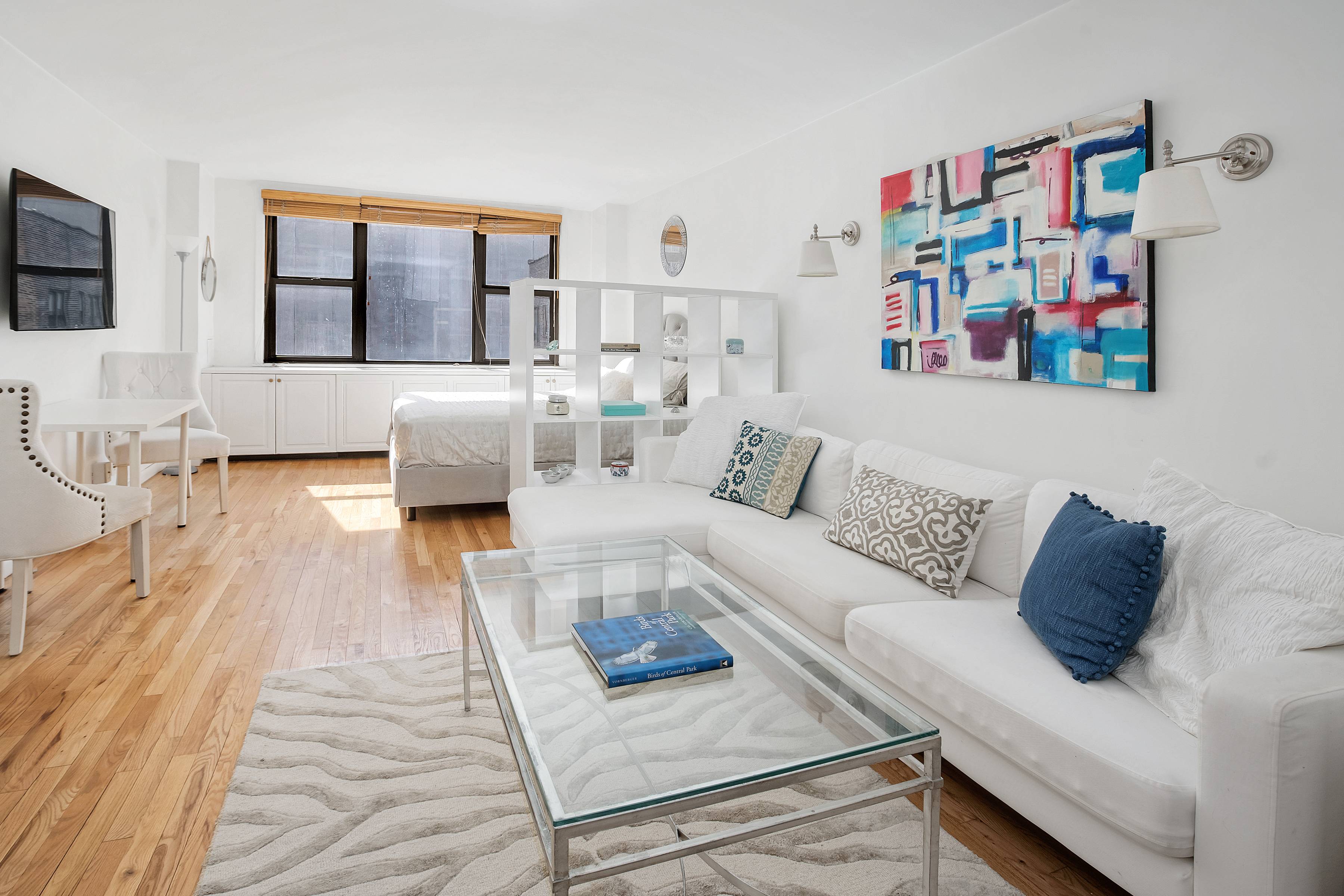 130 East 18th Street Co op 24 hour doorman Common roof deck Pet friendly building Sun filled south facing studio Separate home office area and dressing area with custom built ...