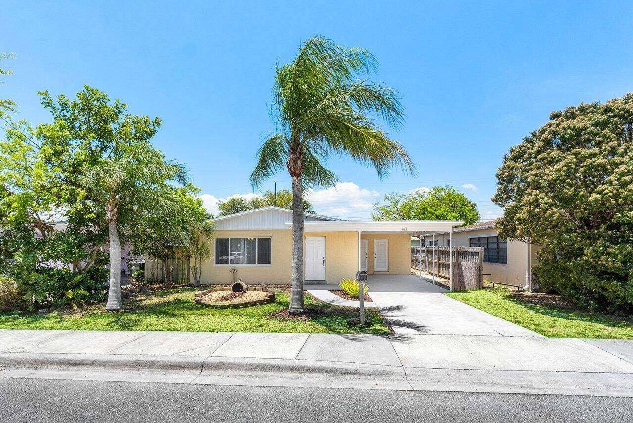Location, location ! Mid Century modern bungalow in fabulous N Lake Worth Beach location minutes to College Park.