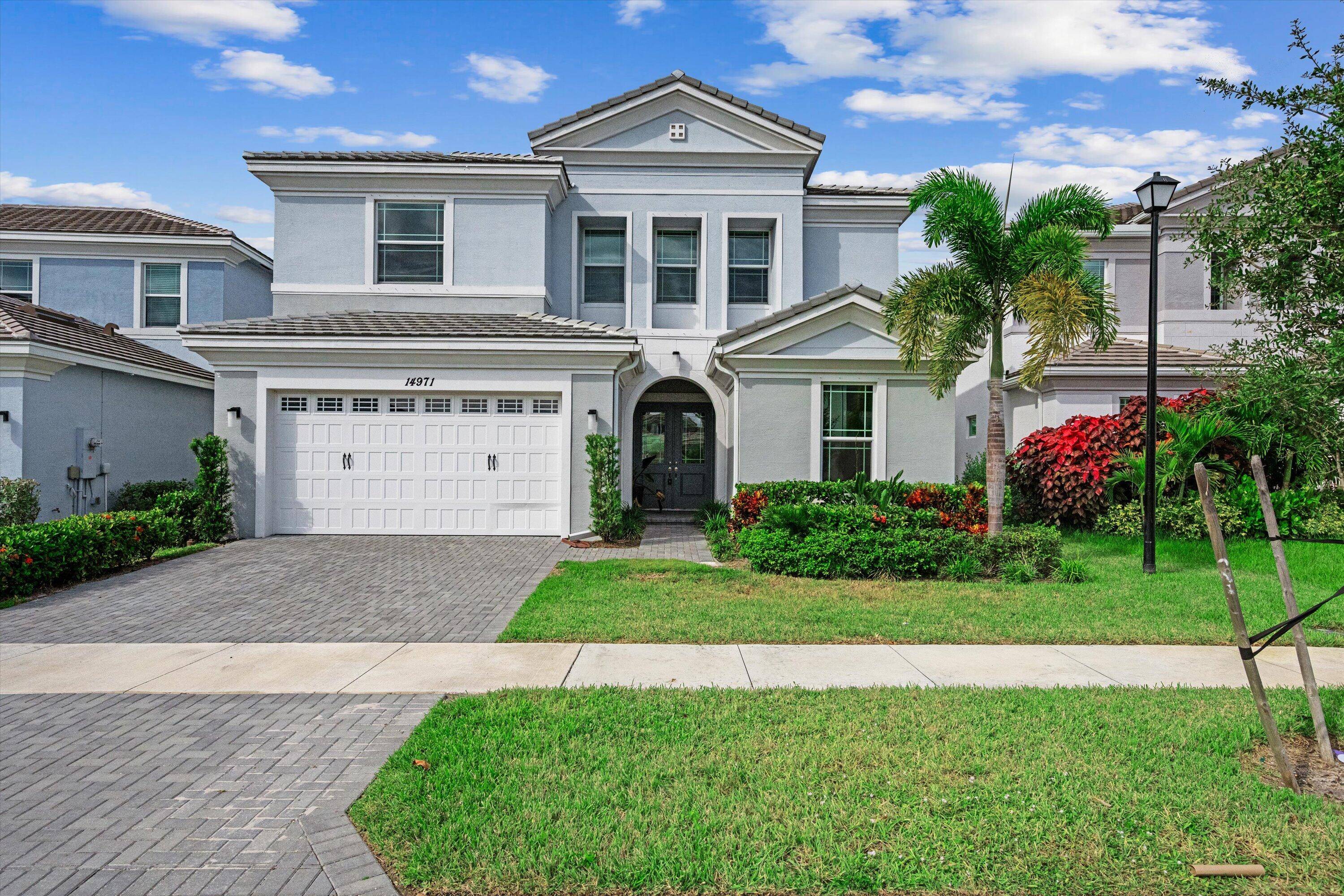Welcome to this spacious two story 6 bedroom, 5 bathroom home located in the desirable community of Westlake, Florida.