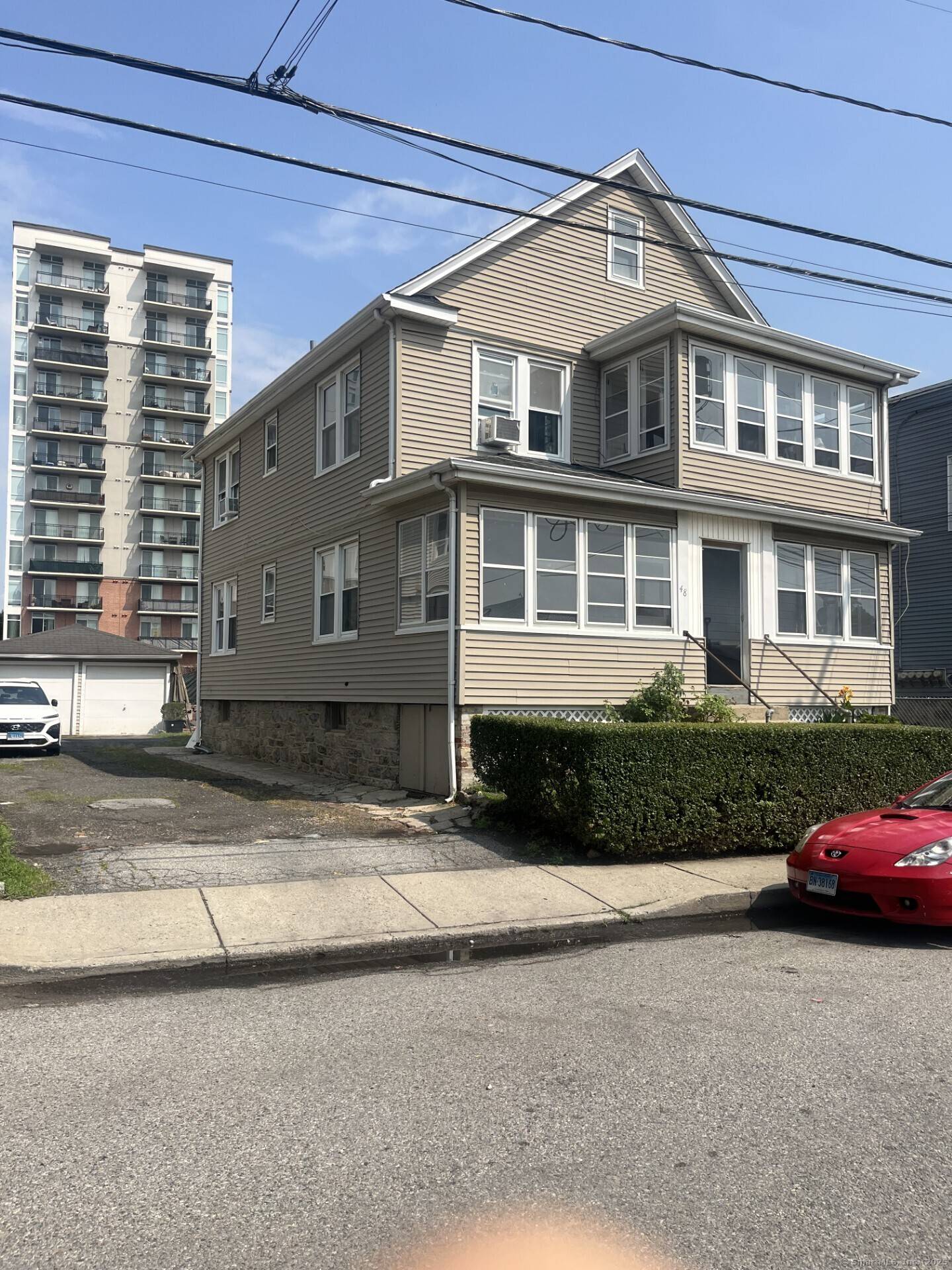 Don't miss this fantastic opportunity to own a charming 2 family home just steps from vibrant Harbor Point in Stamford !