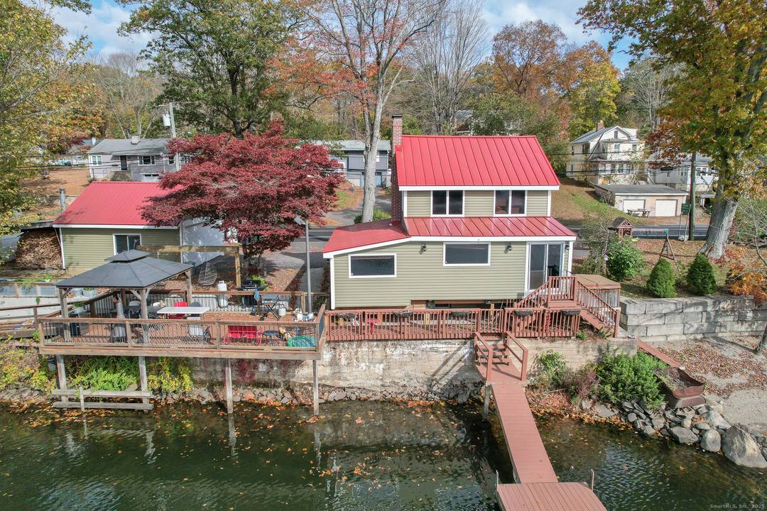 Stunning Direct Waterfront Home with Private Beach, Hot Tub Two Docks Experience the best of waterfront living in this beautifully updated 2 bedroom, 1.