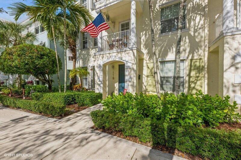 Fabulous turnkey townhome with Live Work option in the heart of Abacoa !