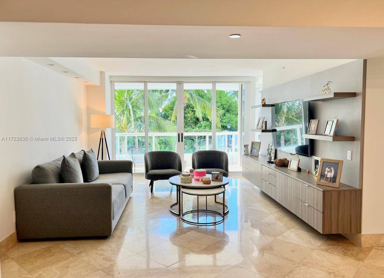 This beautifully renovated 3 bedroom, 2 bathroom condominium is a true gem, showcasing model like perfection throughout.