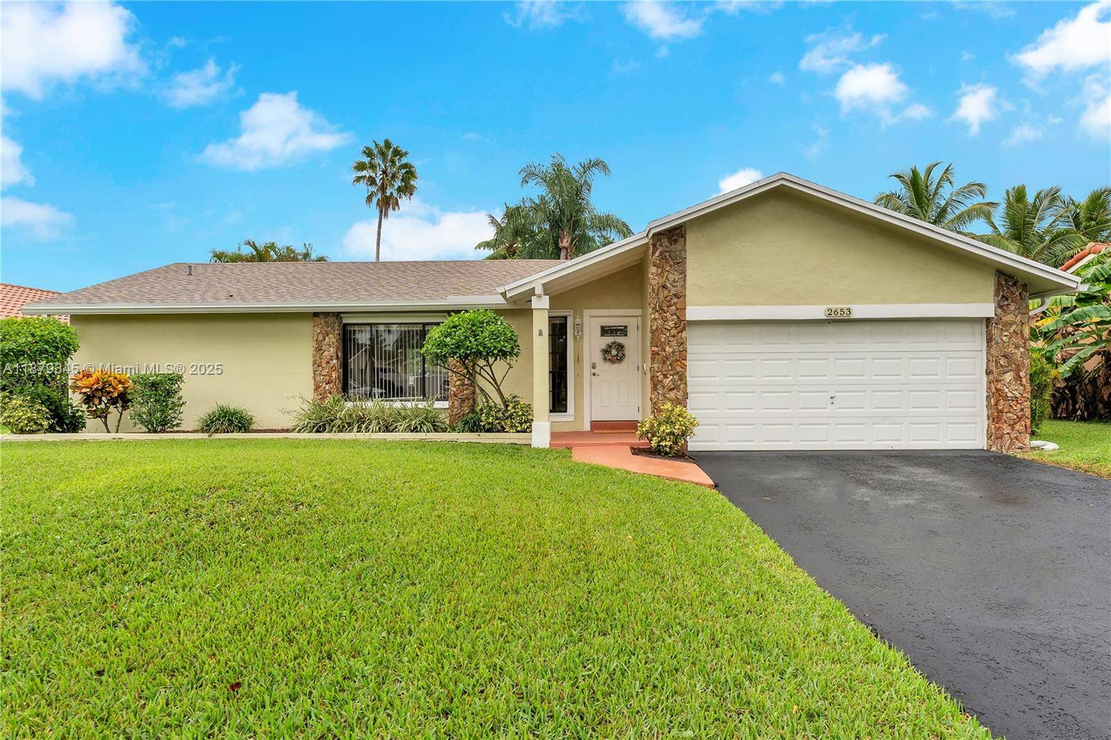 Welcome to your Coral Springs oasis on a quiet cul de sac with no HOA.
