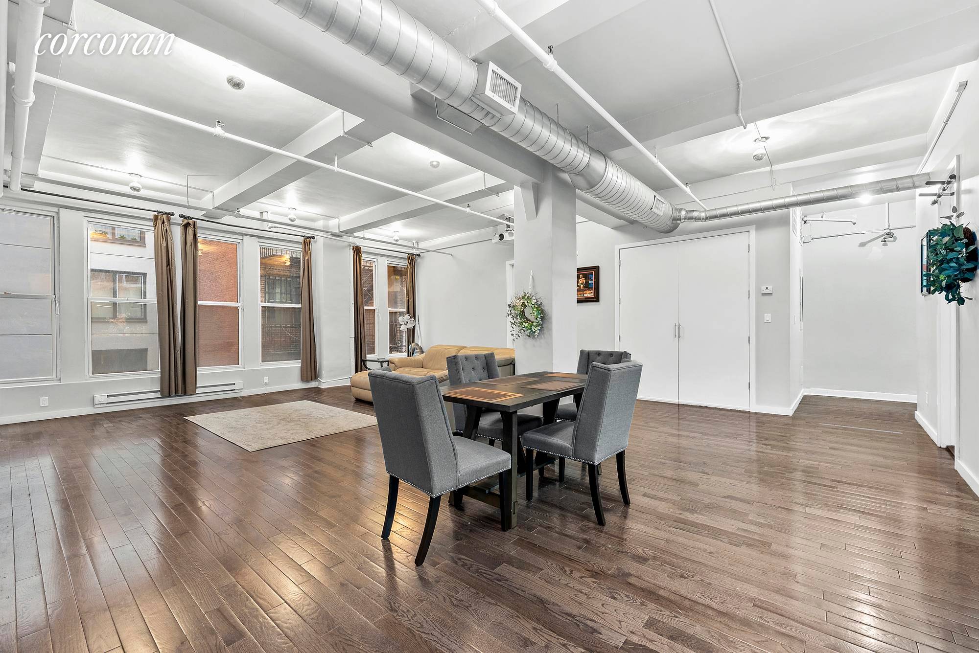 This massive Chelsea Live Work Loft, is on the 5th floor with south facing views, high ceilings and gets tons of natural light.