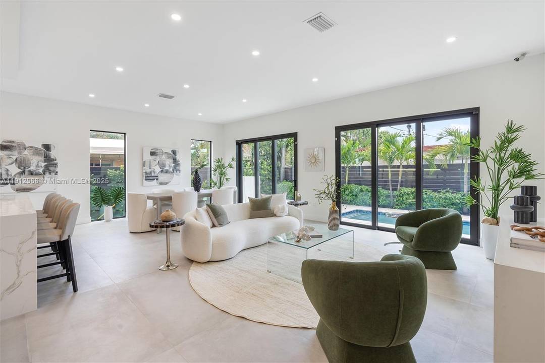 Experience modern elegance and effortless living in the heart of Fort Lauderdale s coveted Coral Ridge.