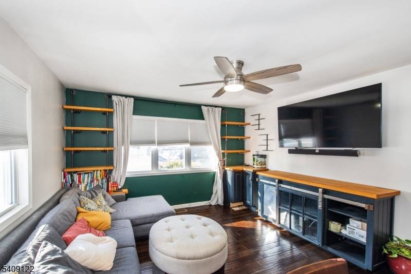 Well maintained and thoughtfully updated two family home set on a spacious corner lot in a convenient Rahway location, close to schools, major highways, and Midtown Direct train access.