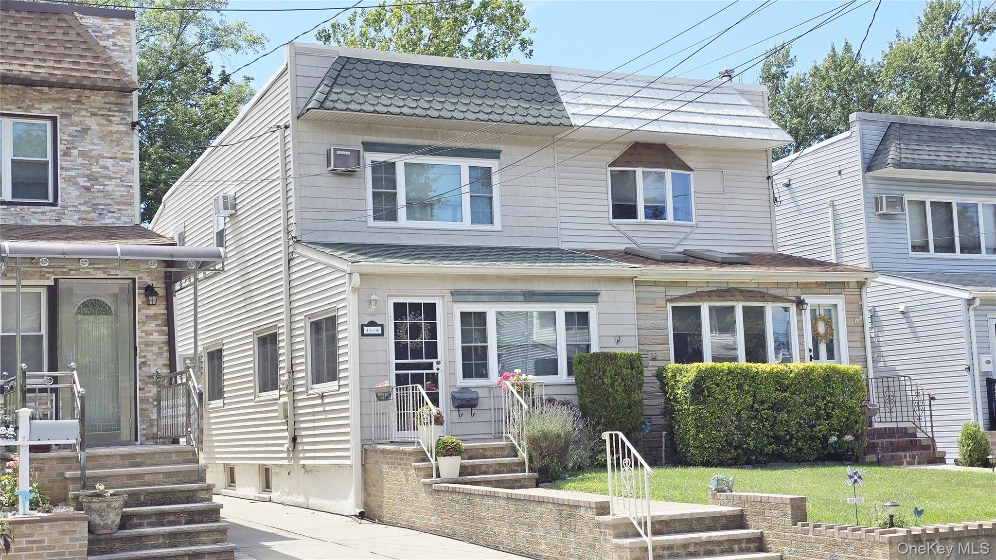 Welcome to this beautifully maintained semi attached Colonial in the heart of Little Neck, offering the perfect blend of comfort, convenience, and charm.