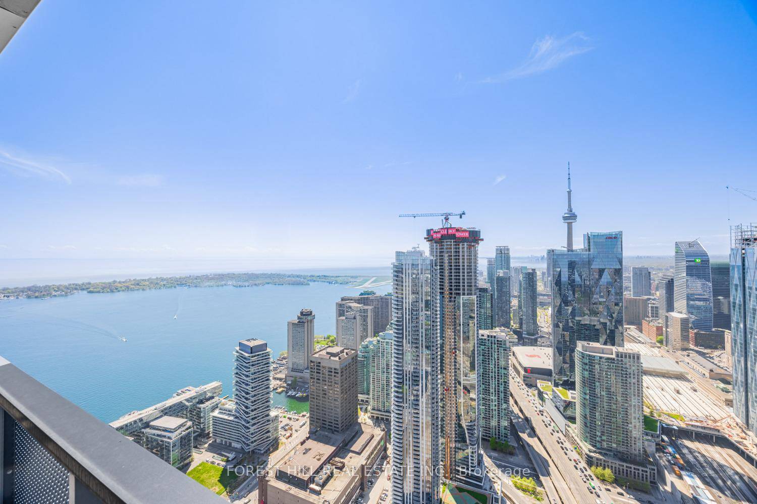 Clear View Rarely Offered Luxurious 3 bedroom, 3 bathroom lower penthouse suite with STUNNING lakeview, located on the 77th level of Sugar Wharf built by Menkes, completed in 2024.