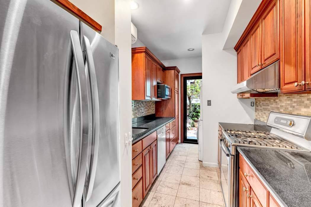 Absolutely gorgeous owner's duplex apartment with sunny private garden just moments from Central Park West.