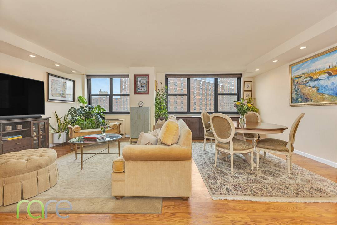 Extraordinary sprawling RARE four bedroom, three bath home with an additional home office study !