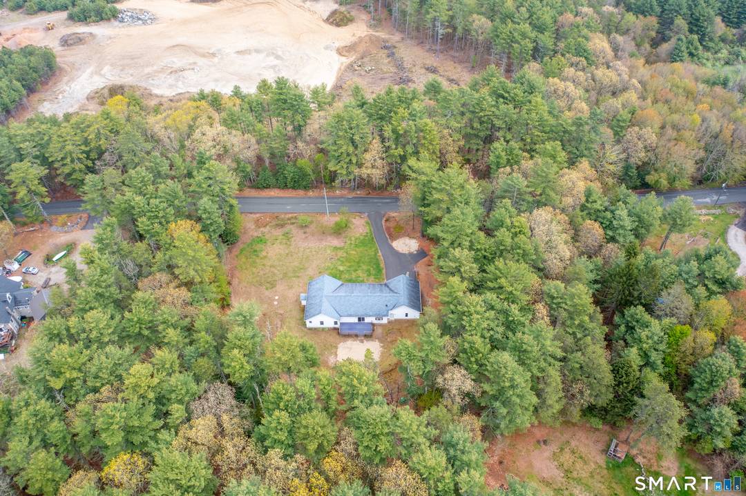 Welcome home ! STUNNING Custom built sprawling Ranch featuring a kitchen made for entertaining with Cherry cabinets made from wood in Connecticut !