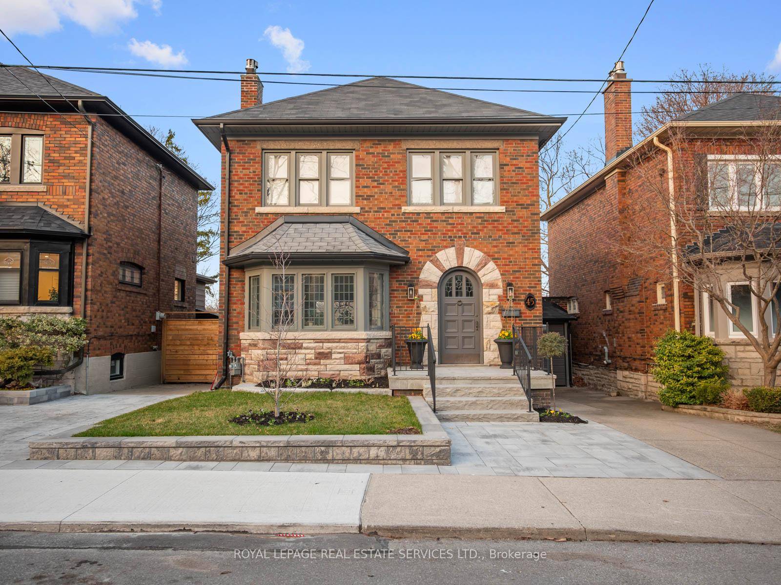 Welcome to 45 Kennedy Park Rd, a beautifully updated 1929 brick home tucked away on one of the most desirable streets in Bloor West High Park.