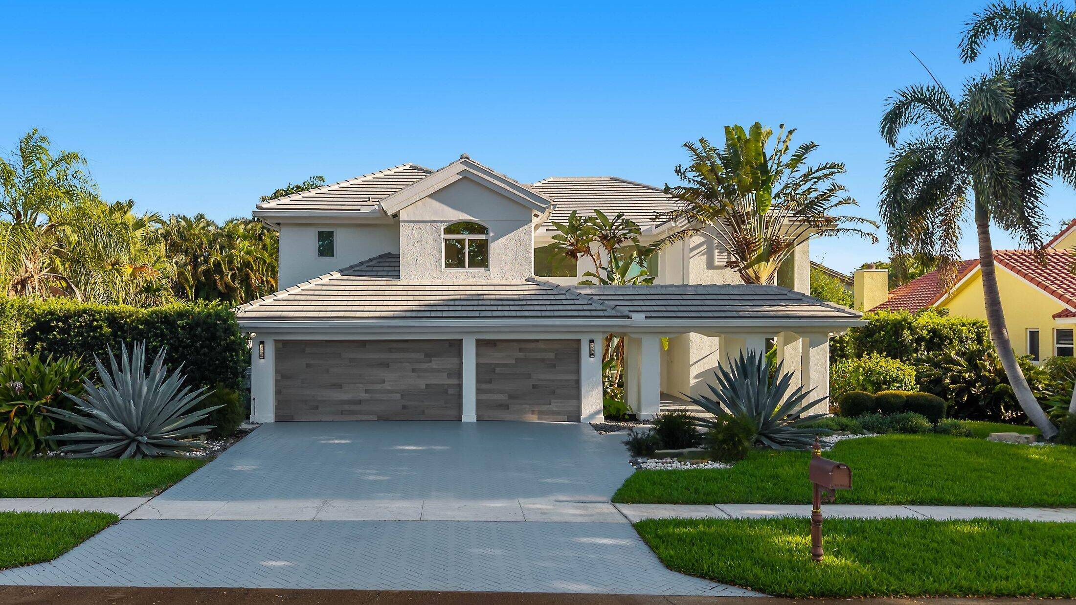 Introducing This Grand Contemporary Estate in Colonnade Completely Reimagined Luxury in Central Boca Raton !
