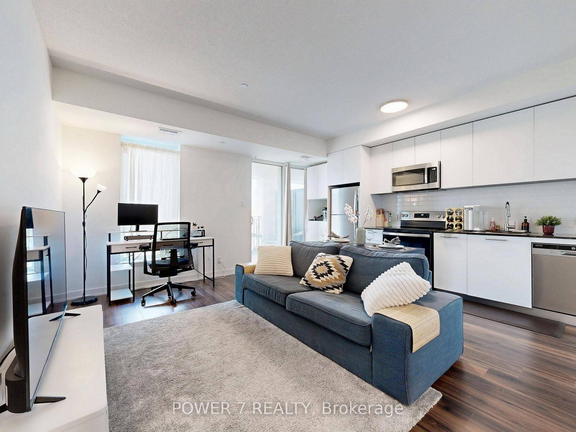 Welcome to 101 Cathedral High Street, Unit 337 a modern 1 bedroom plus den condo offering 633 square feet of thoughtfully designed living space with a north facing open balcony.