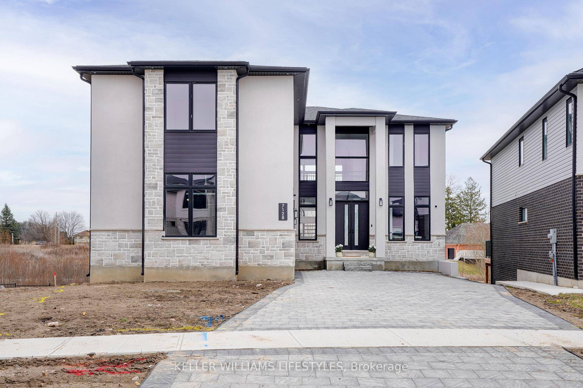 Welcome to this striking contemporary home offering over 3, 800 sq.