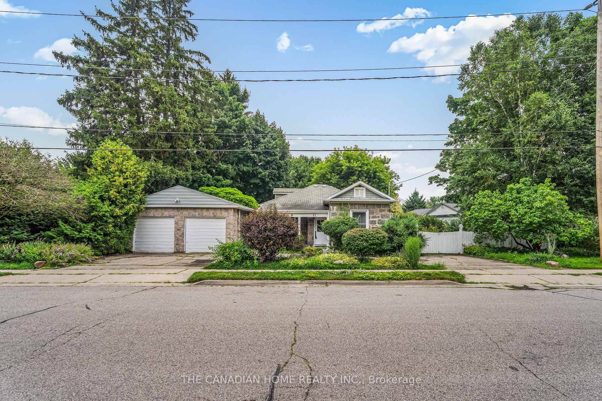 Welcome to this charming stone bungalow in one of Cambridges most sought after neighborhoods !