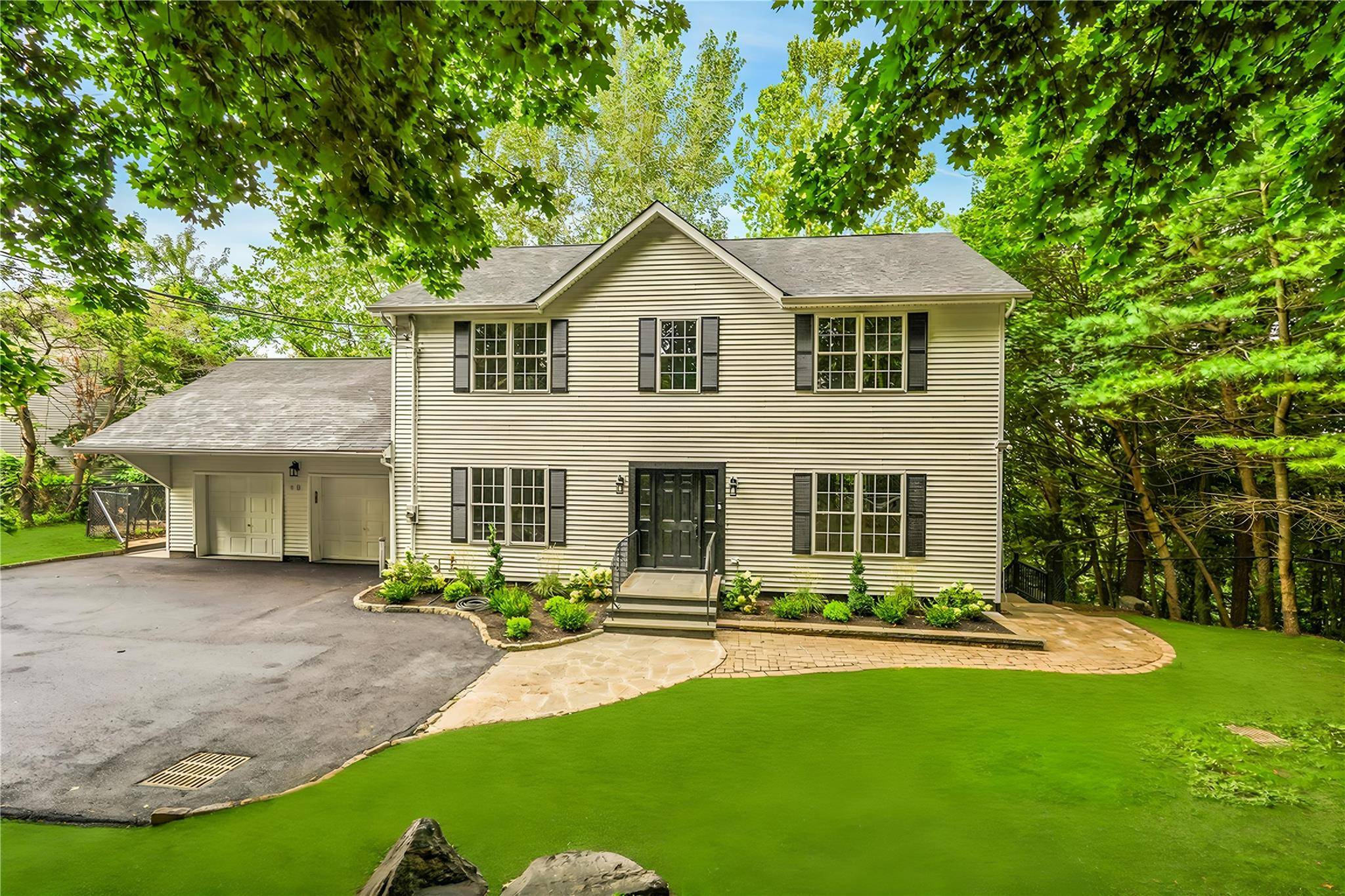 Welcome to 60 Lincoln Place, a beautifully renovated colonial home nestled in the tranquil North White Plains neighborhood of Greenburgh.