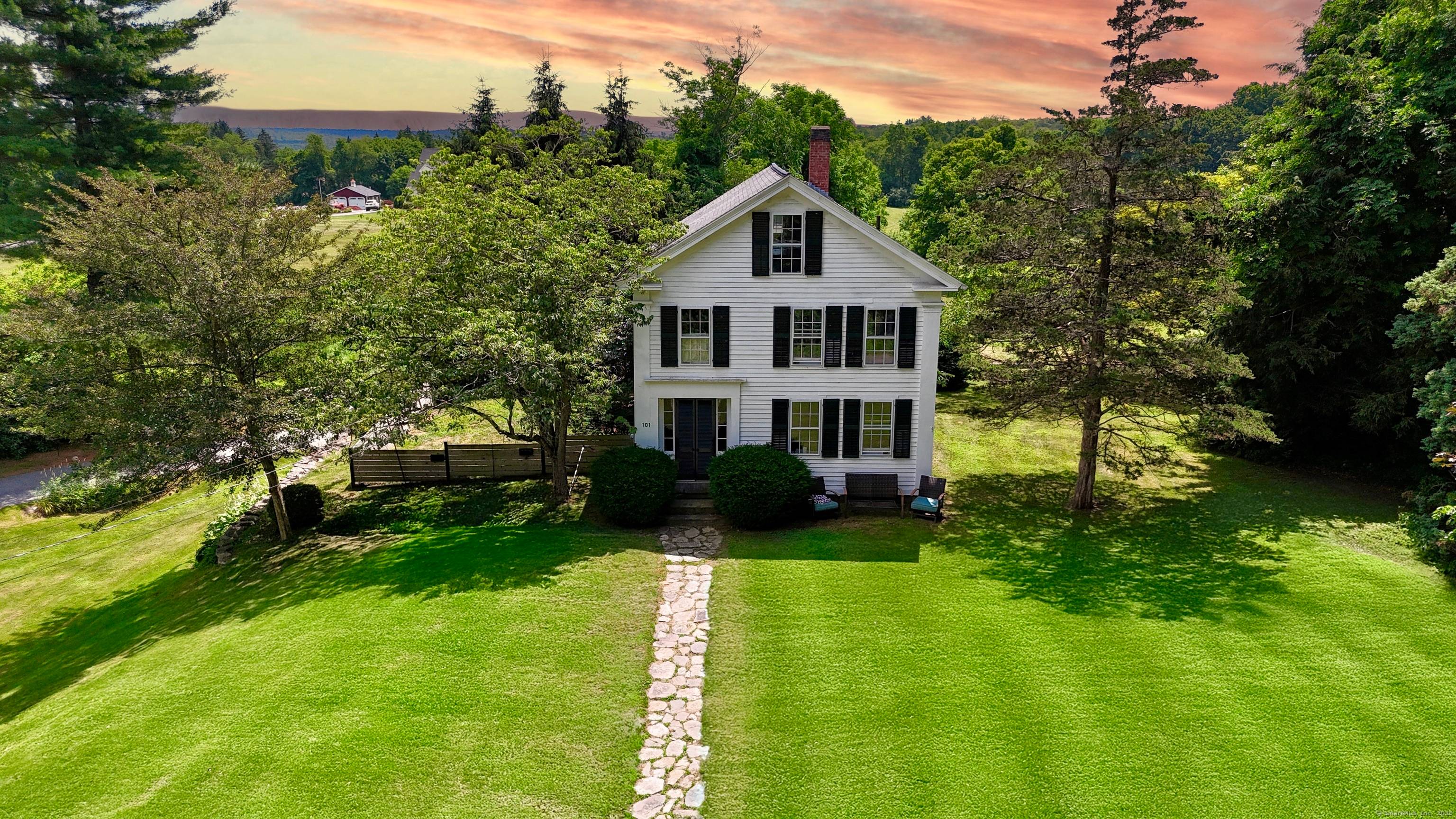 Welcome to this beautiful idyllic colonial, sitting off of Woodstock Hill !