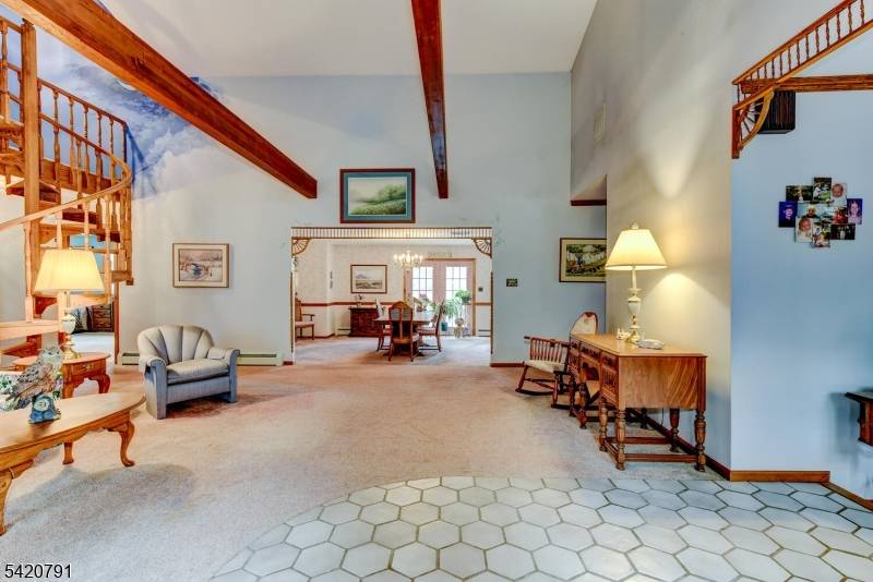 Welcome to this exceptionally spacious four bedroom ranch, perfectly set on an expansive 100 x 200 lot offering both privacy and endless possibilities.