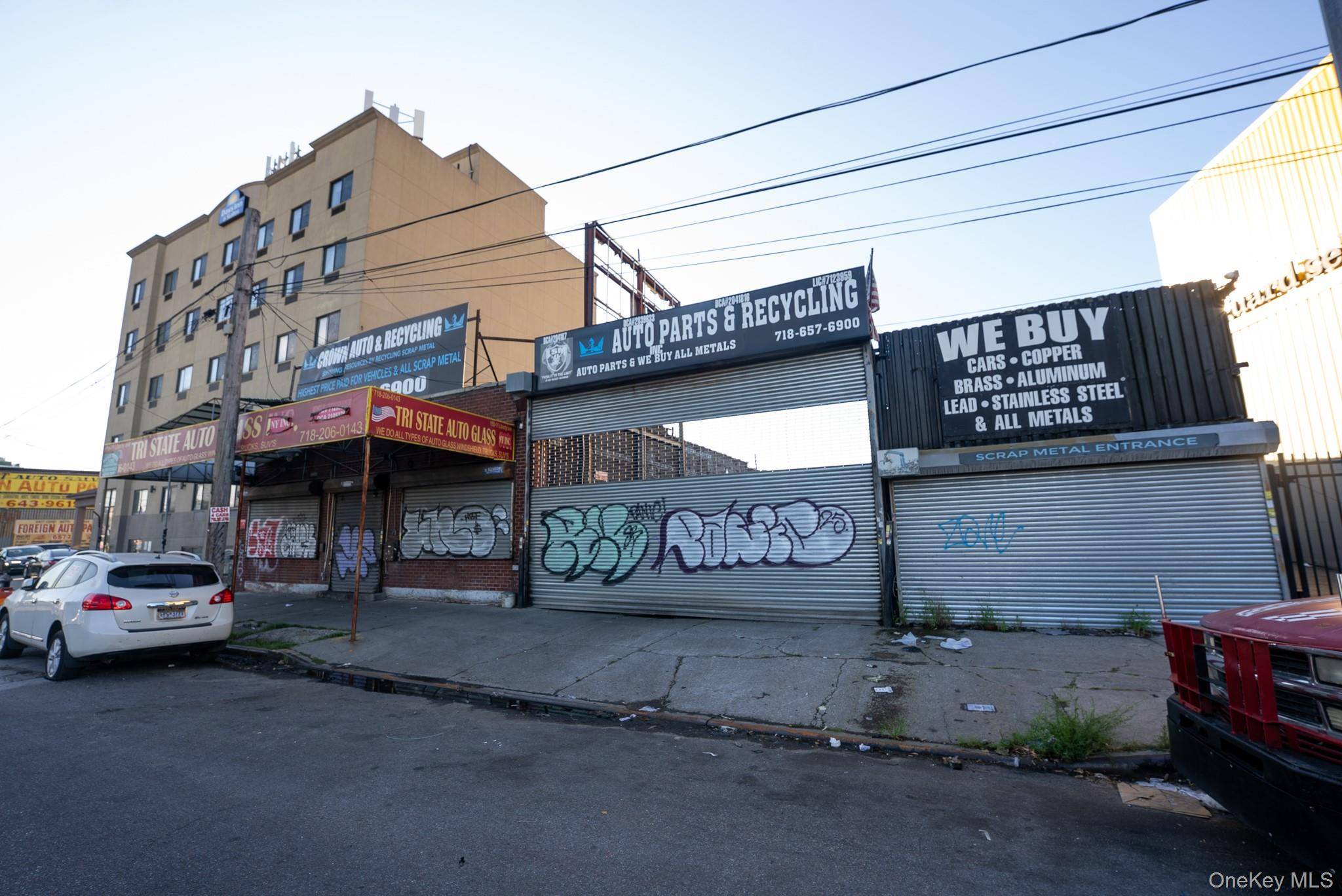 This assemblage consists of three properties currently set up with a mix of commercial retail space and vacant land.
