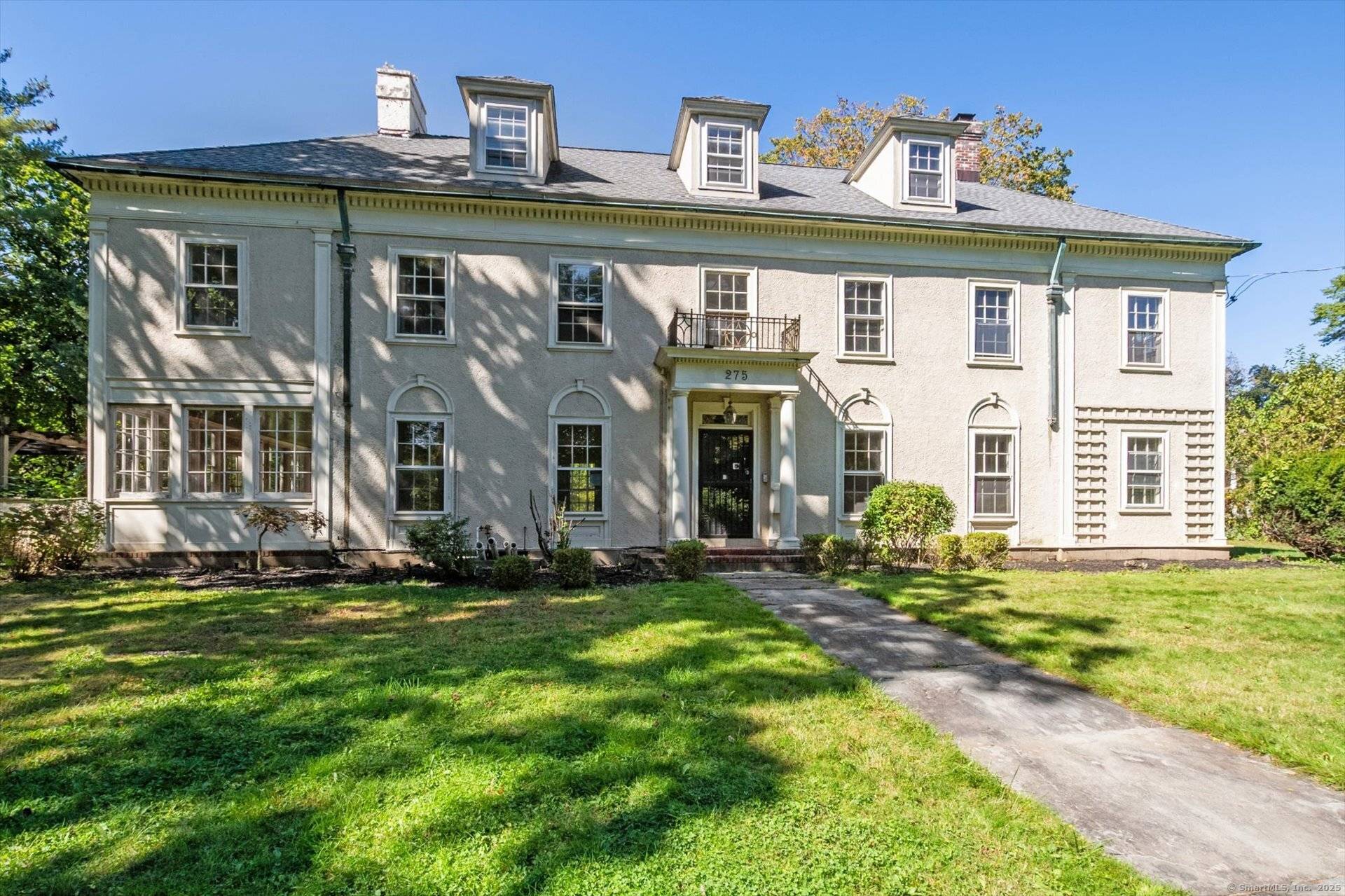 Nestled on an oversized corner lot in one of the West End's most desirable neighborhoods, this elegant Colonial offers the perfect blend of classic charm and modern updates.