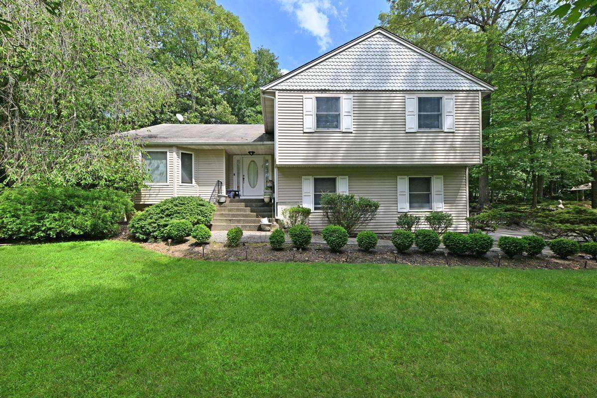 Welcome to this Spacious, thoughtfully designed 5 bedroom, 4 bath split level at the end of a desirable cul de sac.
