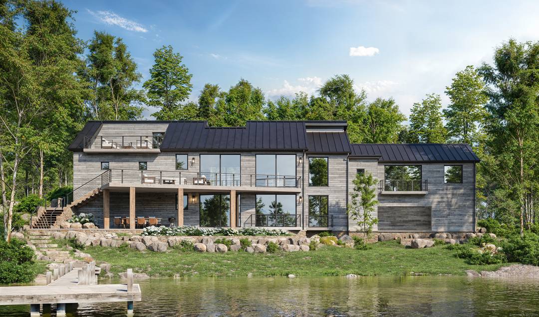 Beautiful waterfront building lot with approved house plans within the Masons Island Private Association located at the southern end of the island.