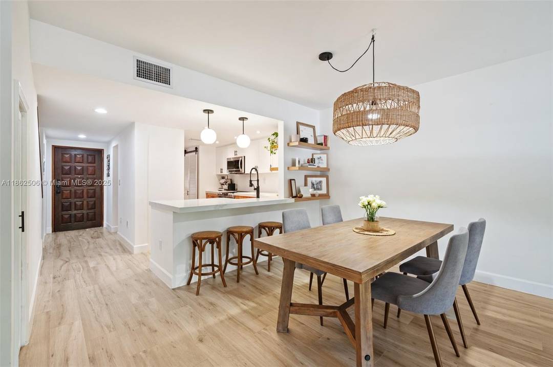 Move in ready remodeled townhome located within a well maintained Coral Gables community.