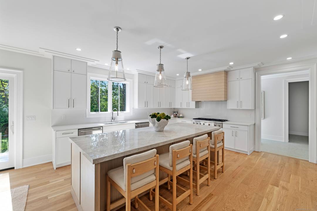 Discover luxury living in the heart of Westport at 32 Webb Road, a newly built 2026 Colonial offering 8, 412 square feet of open concept living on a private 0.
