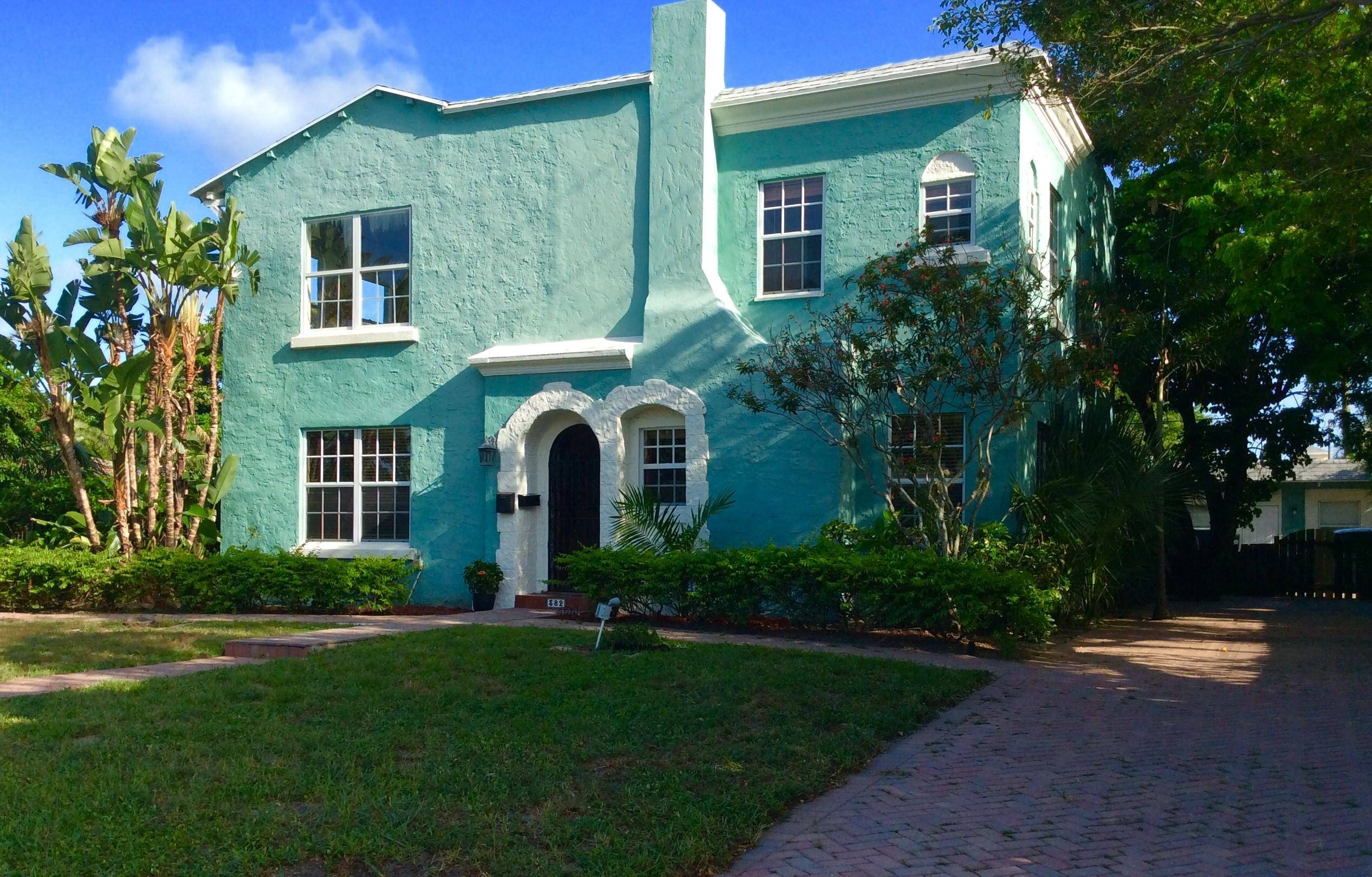 Spectacular 2 Story 11 Room Spanish Style Mission Home in Highly Desirable and Prestigious ''South of Southern' or SOSO, ''new hot'' Neighborhood in Local Waterfront Intracoastal Community.