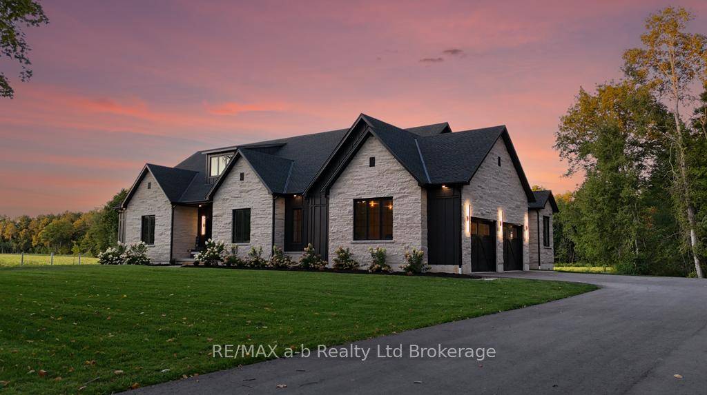 Set on a private country road just minutes from Tillsonburg, 592 Carson Side Road is designed for both everyday comfort and exceptional entertaining.