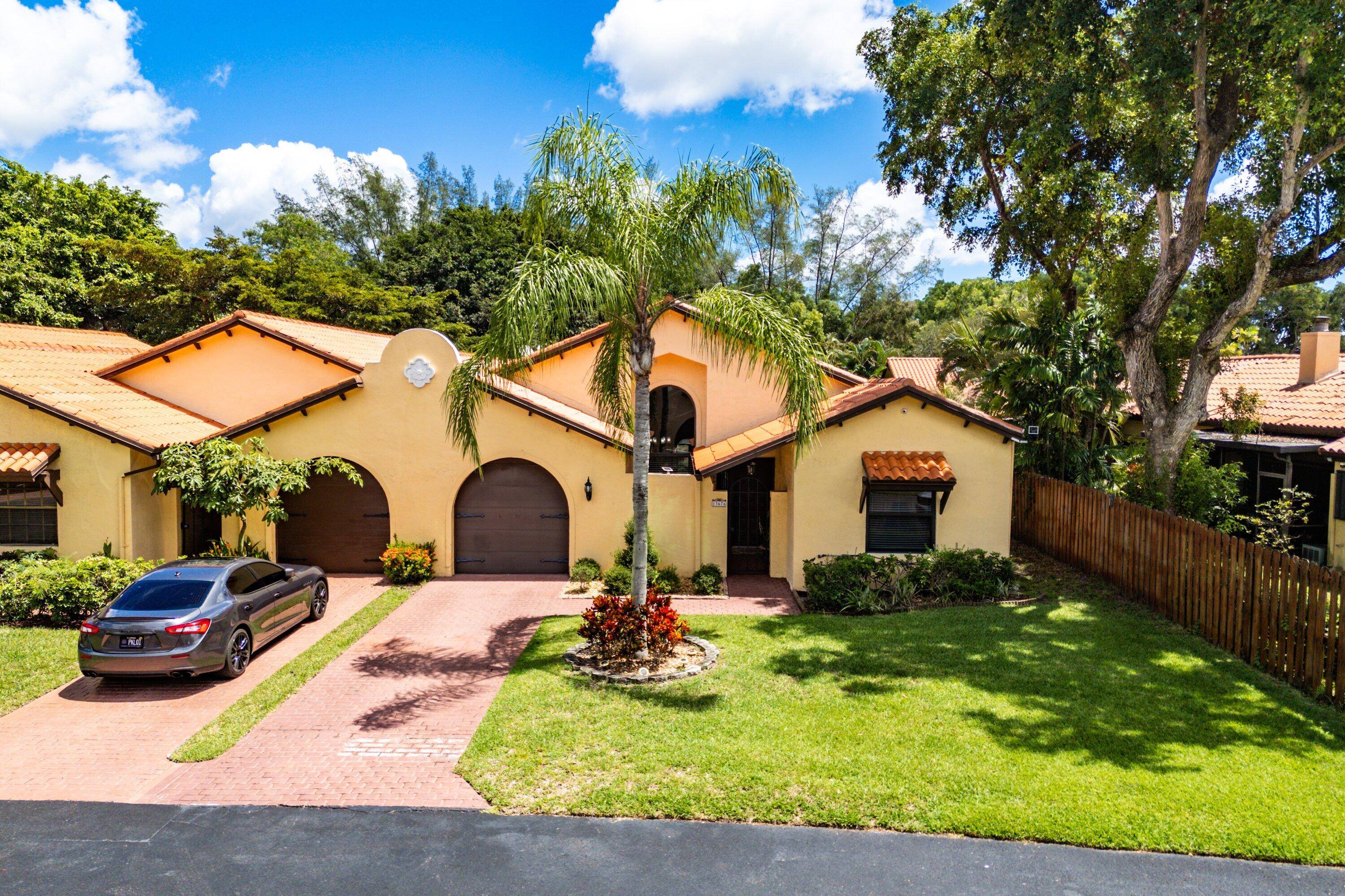 The master suite is a sanctuary of its own, highlighted by two generous walk in closets, while the third bedroom serves as a versatile den, adaptable to your personal needs.