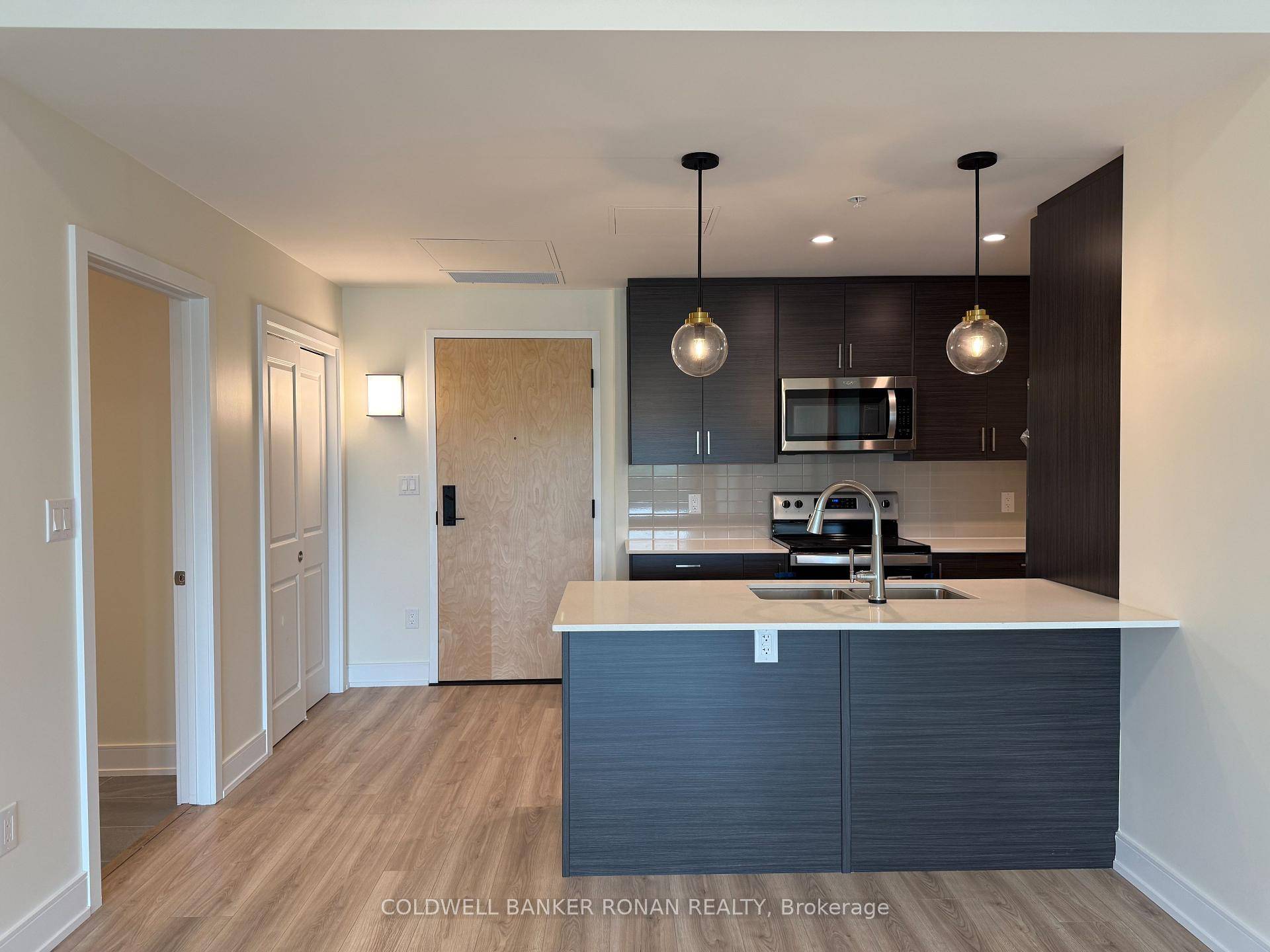 Suite 319 ! Discover this newly built spacious condominium in the charming, quaint Village of Creemore.