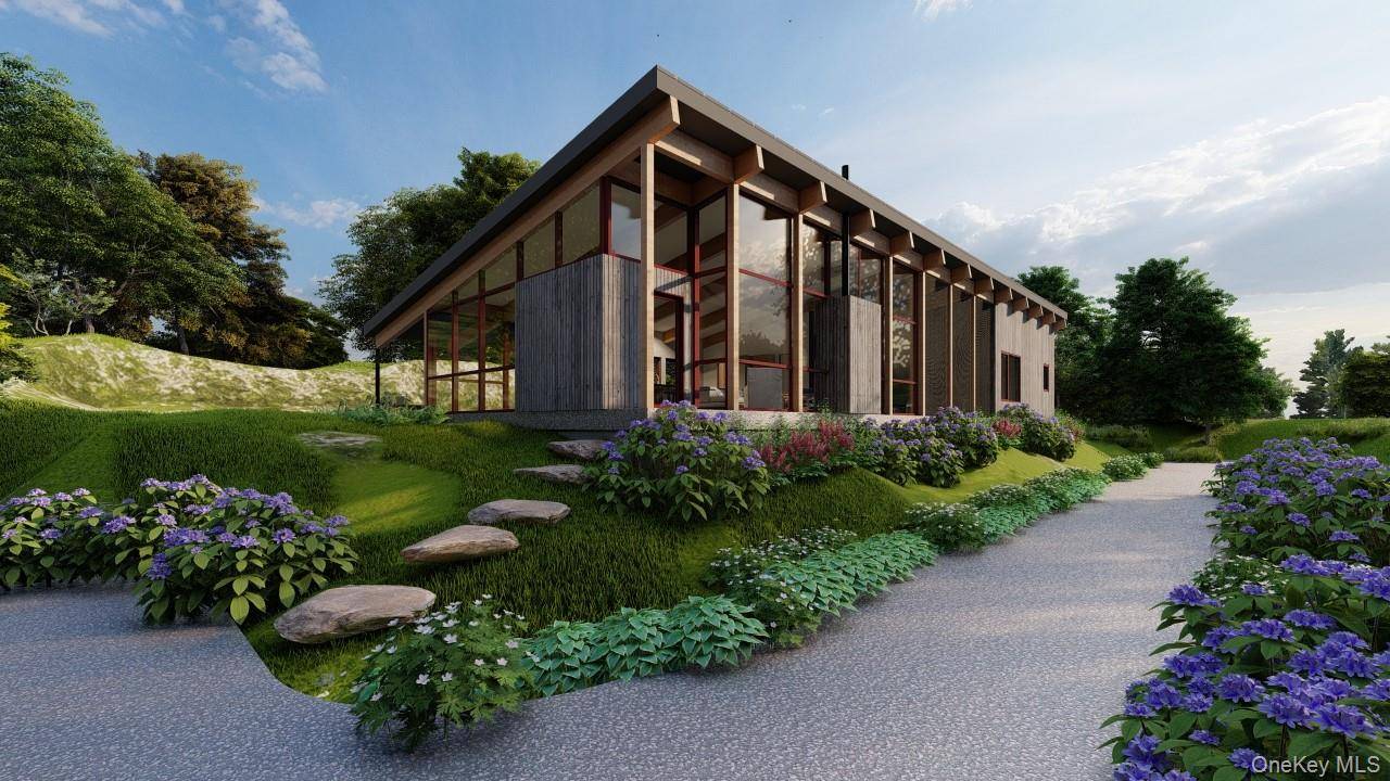Discover the rare opportunity to build your custom modern ranch in the tranquil countryside of Sherman, Connecticut, just minutes from the New York line.