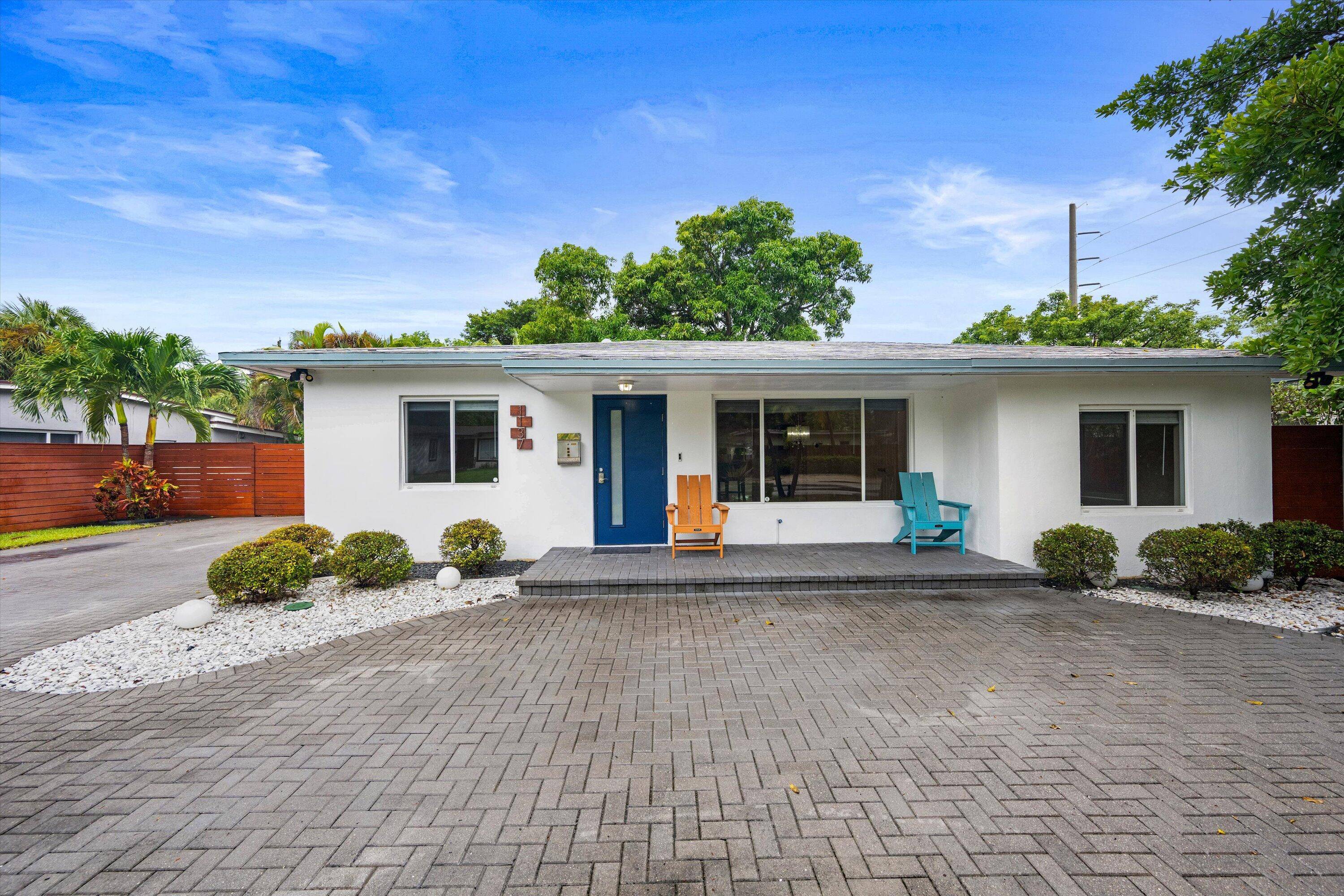 Enjoy the best of Fort Lauderdale living in this spacious 4 bedroom, 3 bath home featuring two primary suites, an open floor plan, and a large circular driveway for easy ...