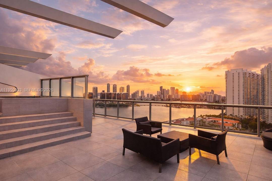 Enter a refined Upper Penthouse Residence with sweeping, unobstructed bay views and a private rooftop retreat featuring a plunge pool.